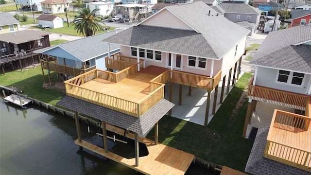 aerial view with a water view and a residential view