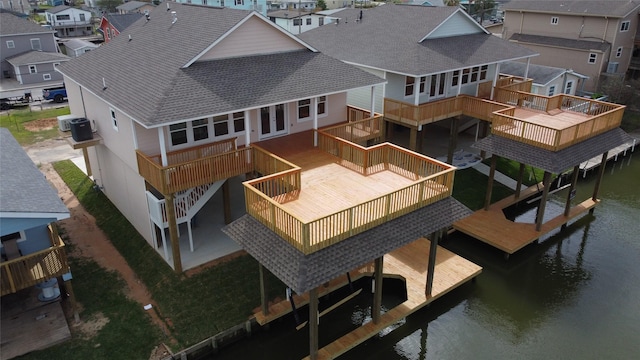 aerial view with a residential view and a water view