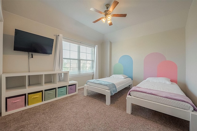 bedroom featuring baseboards, a ceiling fan, and carpet