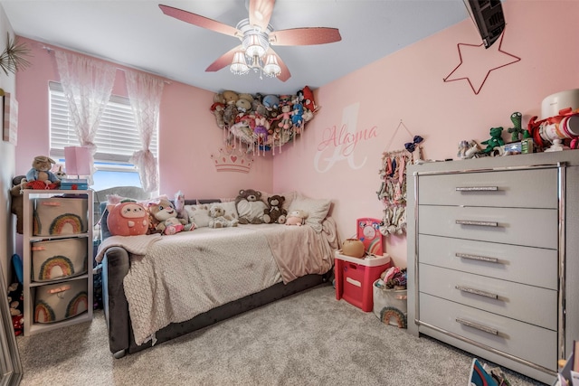 bedroom with carpet and a ceiling fan