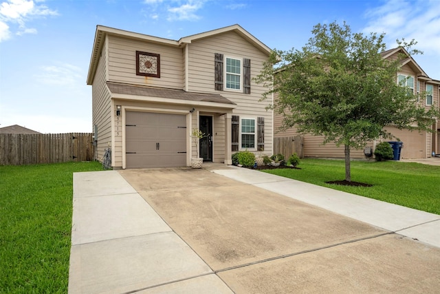 traditional home with a garage, fence, and a front lawn