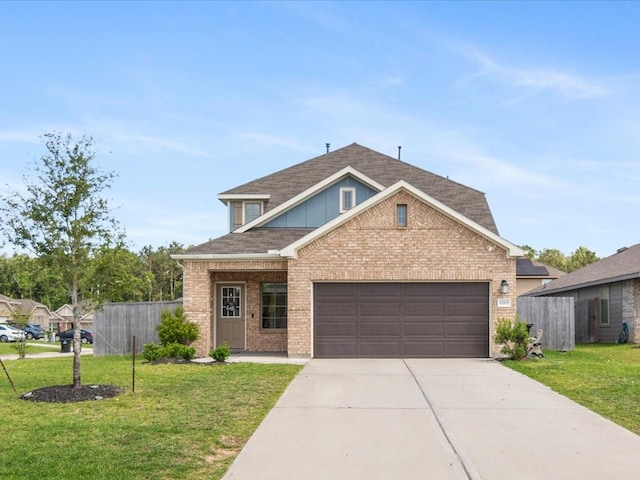 traditional-style house with brick siding, fence, and concrete driveway