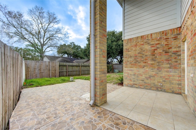 view of patio featuring a fenced backyard