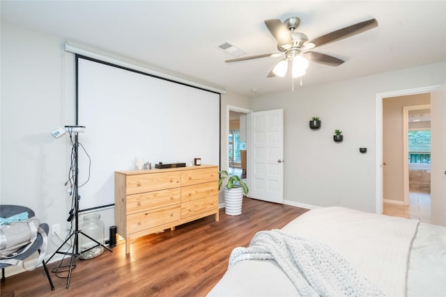 6226 Allentown Dr, Spring, TX 77389 - bedroom featuring baseboards, ceiling fan, visible vents, and wood finished floors