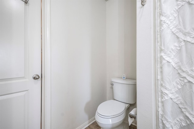 bathroom featuring toilet