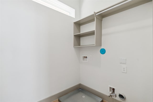 laundry area with gas dryer hookup, hookup for a washing machine, and laundry area