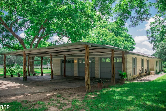 view of car parking featuring a detached garage