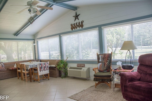 sunroom featuring tile patterned floors, lofted ceiling with beams, and an AC wall unit