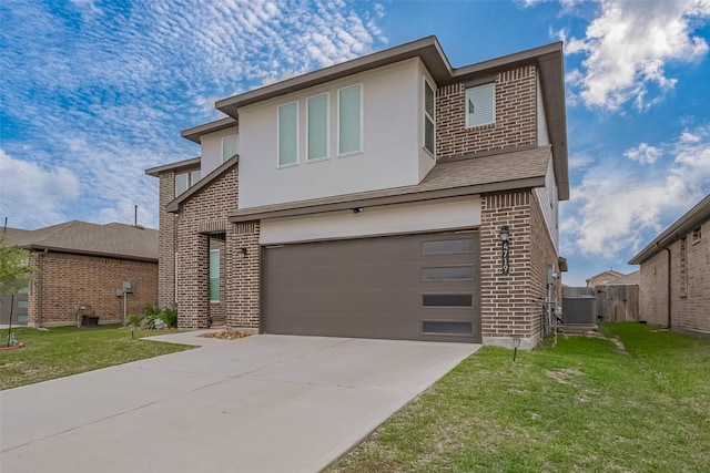 view of front of house featuring a front lawn, brick siding, driveway, and a garage