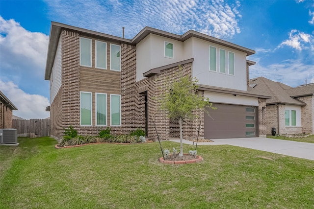 view of front of house with stucco siding, driveway, central AC unit, and brick siding