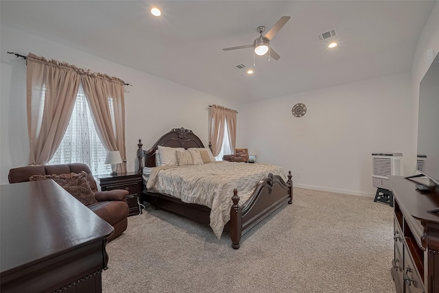 bedroom with a ceiling fan, visible vents, recessed lighting, and light colored carpet