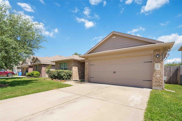 7218 Alava Dr, Magnolia, TX 77354 - single story home with concrete driveway, brick siding, and a garage
