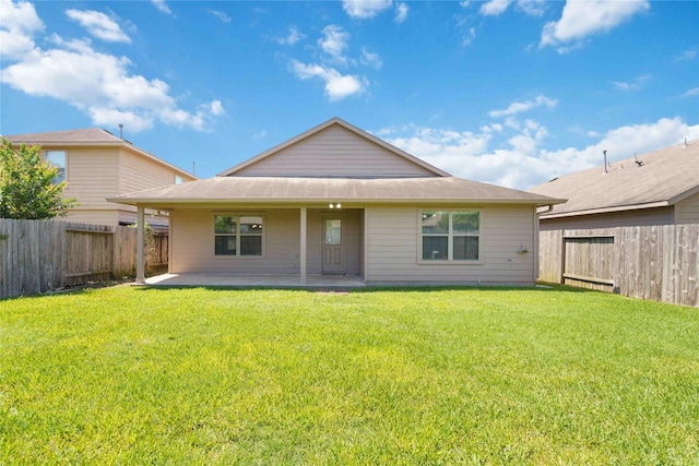 7218 Alava Dr, Magnolia, TX 77354 - rear view of house with a patio