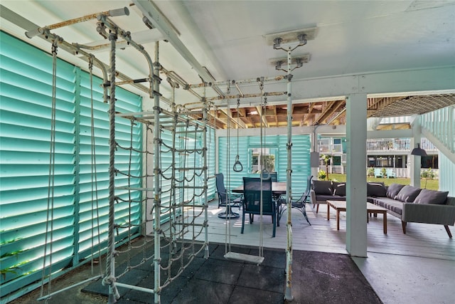 604 Calico Jack Cv, Galveston, TX 77554 - view of patio / terrace featuring a deck, outdoor lounge area, and outdoor dining area