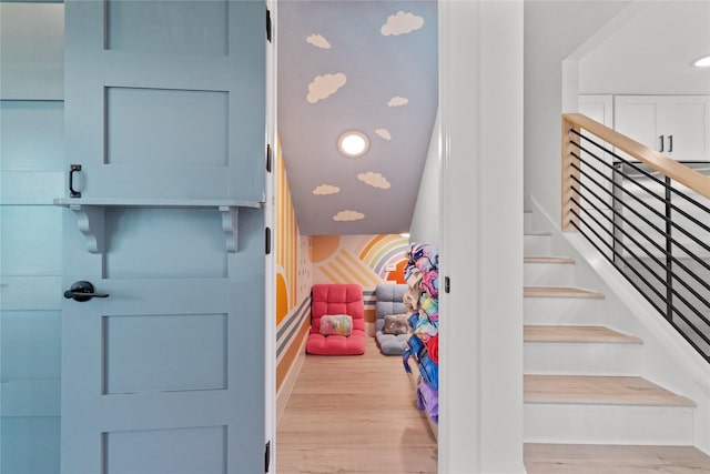 604 Calico Jack Cv, Galveston, TX 77554 - staircase with wood finished floors and recessed lighting
