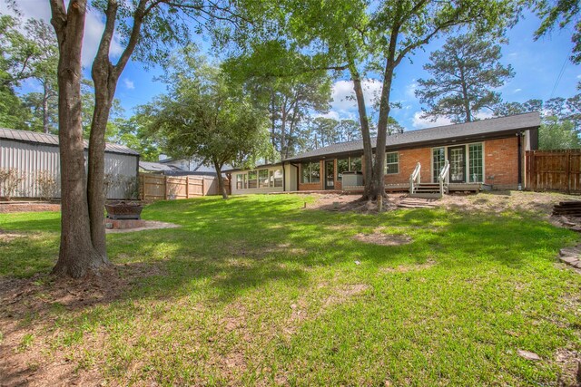 view of yard featuring a fenced backyard