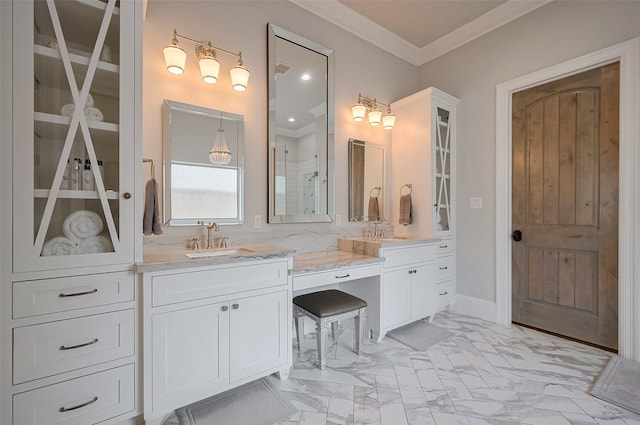 bathroom featuring crown molding, double vanity, marble finish flooring, and a shower