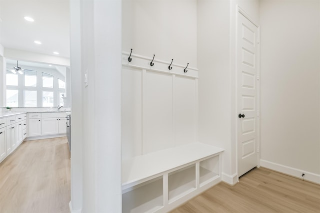 mudroom with baseboards, recessed lighting, light wood-style floors, and ceiling fan