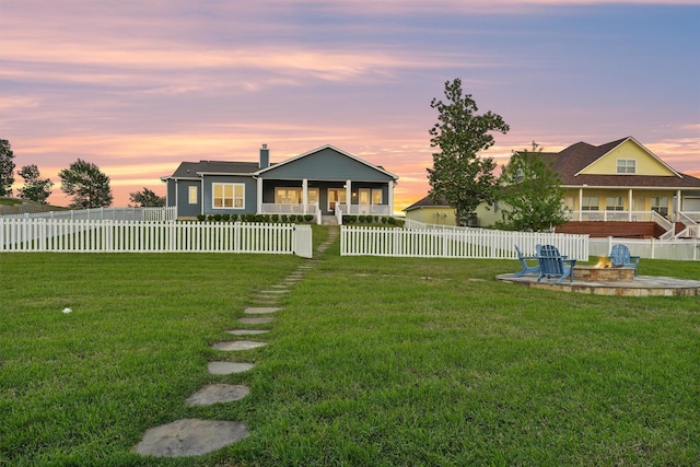 254 Peninsula Dr, Livingston, TX 77351 - view of yard with a patio area, a porch, a fenced backyard, and an outdoor fire pit