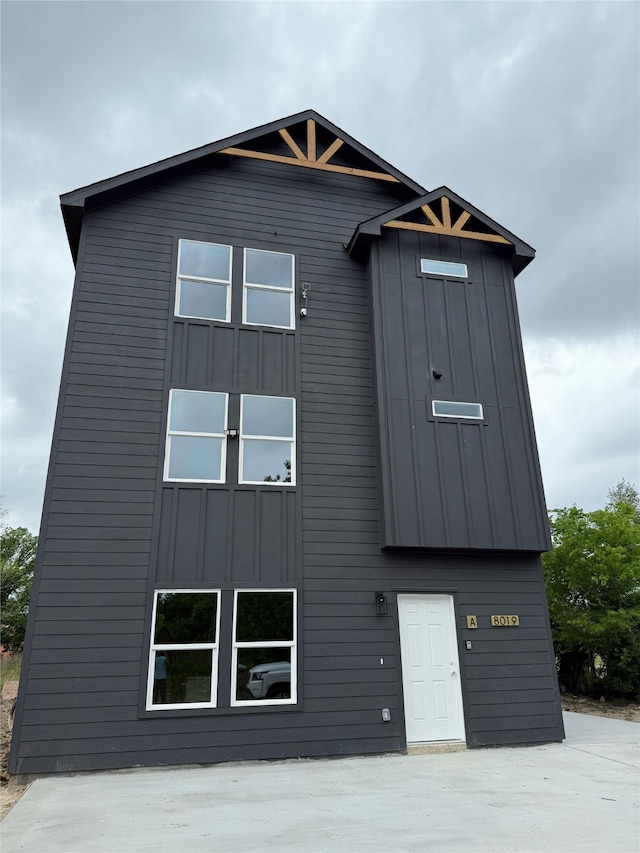 view of front of house with board and batten siding