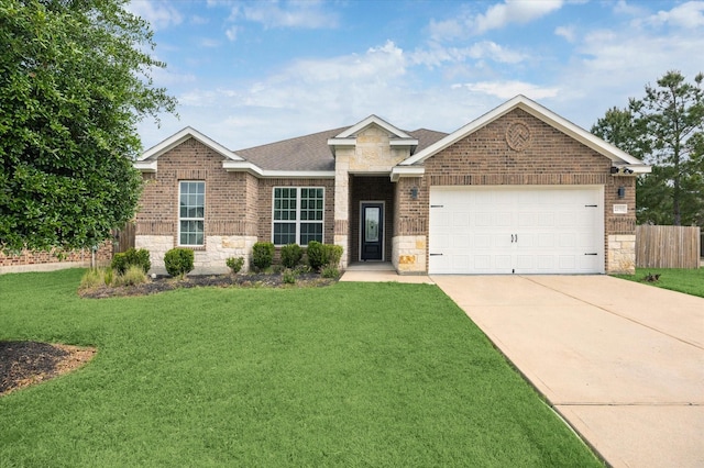22702 Crate Falls Dr, Hockley, TX 77447 - ranch-style home with a garage, a front yard, stone siding, and concrete driveway