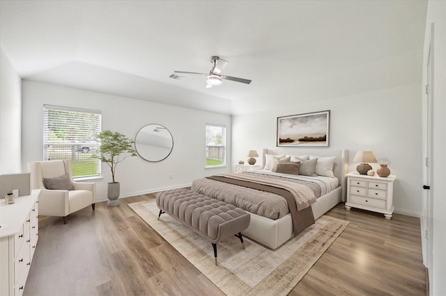 22702 Crate Falls Dr, Hockley, TX 77447 - bedroom with a ceiling fan, baseboards, and wood finished floors