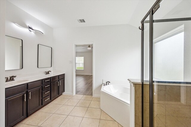 22702 Crate Falls Dr, Hockley, TX 77447 - bathroom featuring ceiling fan, visible vents, a sink, and a garden tub