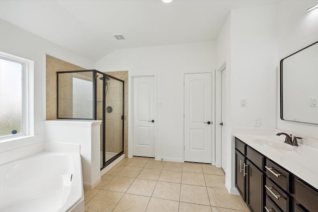 22702 Crate Falls Dr, Hockley, TX 77447 - bathroom featuring tile patterned flooring, a shower stall, lofted ceiling, and visible vents