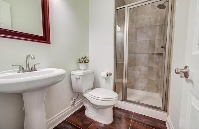 1840 Leela Springs Dr, Conroe, TX 77304 - full bath with toilet, baseboards, and a stall shower