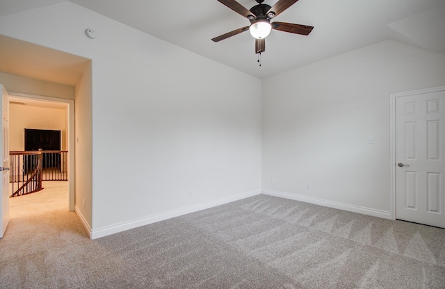 1840 Leela Springs Dr, Conroe, TX 77304 - spare room featuring vaulted ceiling, carpet, baseboards, and ceiling fan