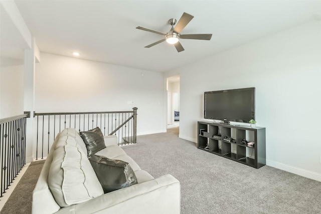 20002 Roan Ardennes Ln, Tomball, TX 77377 - carpeted living room with ceiling fan and baseboards