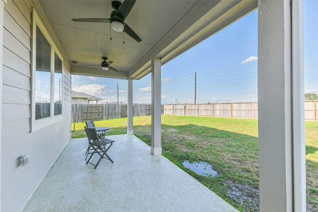 view of patio / terrace with a fenced backyard and a ceiling fan