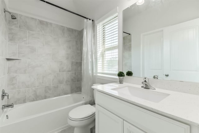full bath with toilet, vanity, and shower / bath combination with curtain
