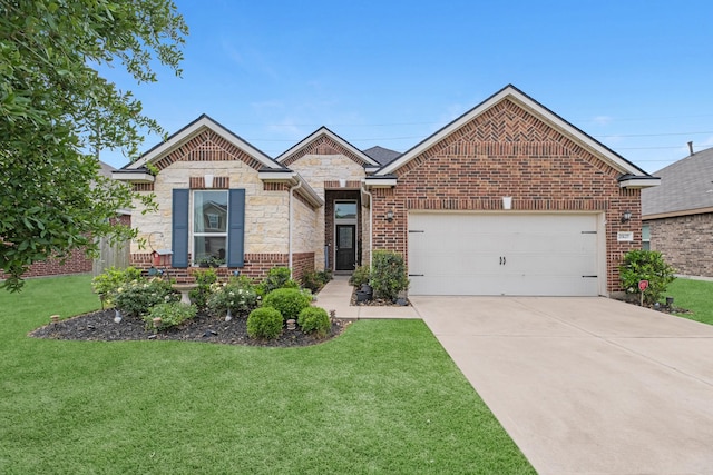 view of front of house featuring a front lawn, an attached garage, driveway, stone siding, and brick siding
