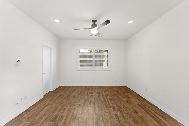 unfurnished room featuring baseboards, ceiling fan, recessed lighting, and wood finished floors