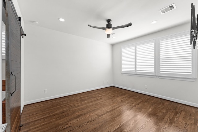312 Eado Park Cir, Houston, TX 77020 - spare room featuring ceiling fan, dark wood finished floors, baseboards, and recessed lighting
