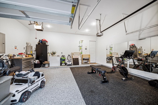 8818 Laurel Crest Dr, Missouri City, TX 77459 - garage featuring electric panel and a garage door opener