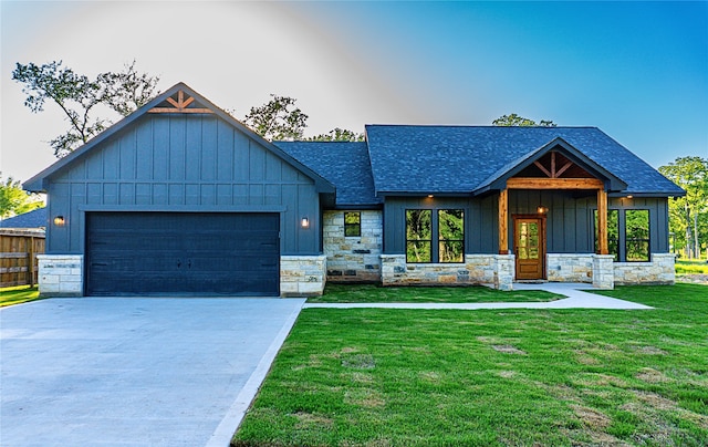 24994 Armagh St, Hempstead, TX 77445 - view of front of property with a shingled roof, board and batten siding, concrete driveway, and stone siding