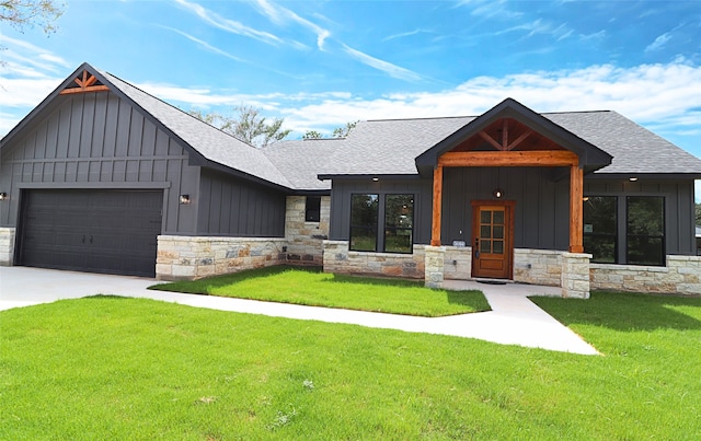 24994 Armagh St, Hempstead, TX 77445 - modern farmhouse featuring board and batten siding, a shingled roof, and stone siding