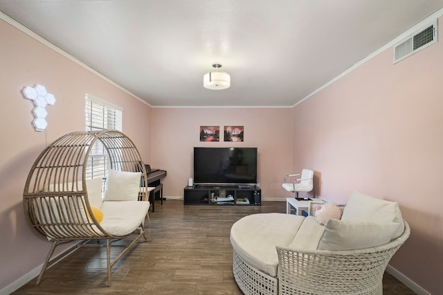 8931 Gaylord St Unit 161, Houston, TX 77024 - living room with baseboards, ornamental molding, wood finished floors, and visible vents