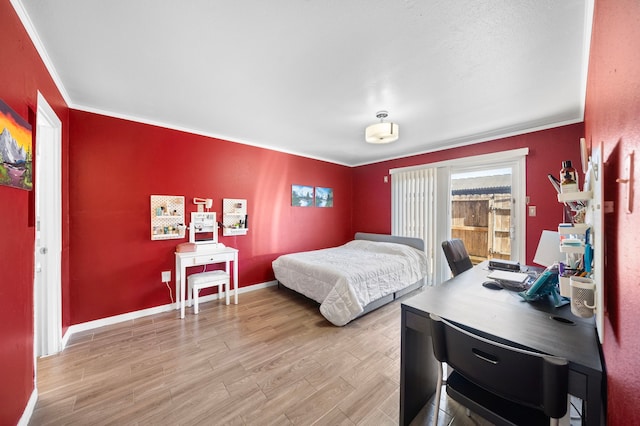 8931 Gaylord St Unit 161, Houston, TX 77024 - bedroom with baseboards, crown molding, and light wood-type flooring