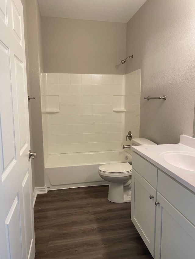 5423 Avenue N 1/2 Ave N Unit 1/2, Galveston, TX 77551 - full bathroom featuring wood finished floors, vanity,  shower combination, and toilet