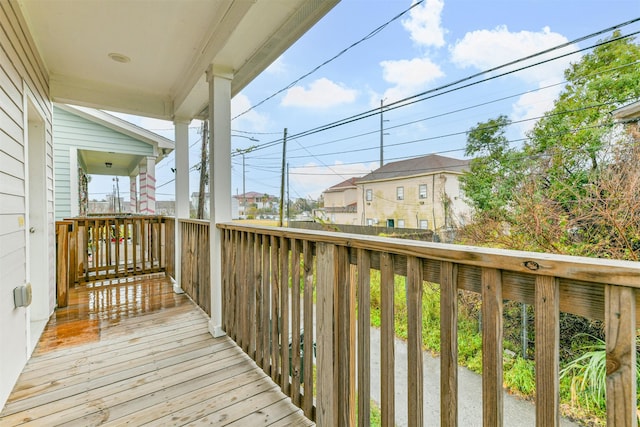 2811 Winnie St, Galveston, TX 77550 - wooden deck with a residential view