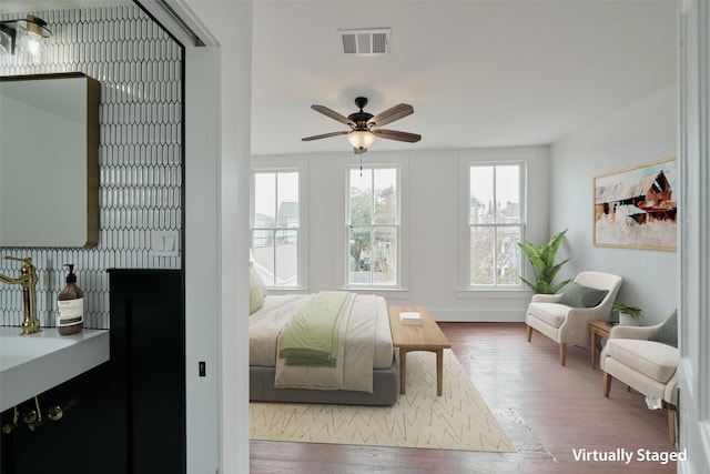1323 Ball, Galveston, TX 77550 - bedroom with wood-type flooring and baseboards
