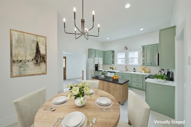 empty room with a chandelier, visible vents, and baseboards