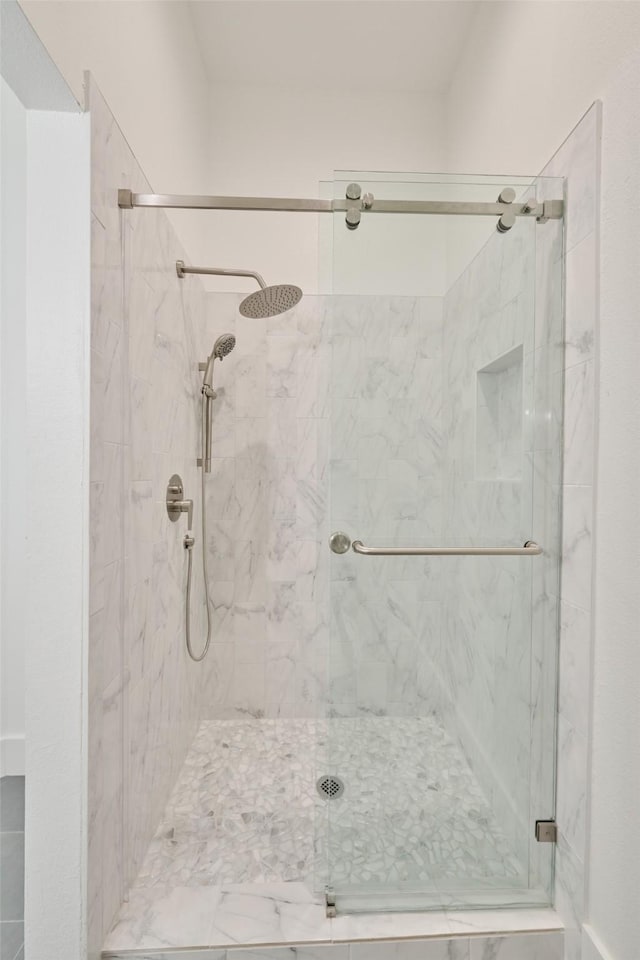 1323 Ball, Galveston, TX 77550 - full bathroom with a marble finish shower