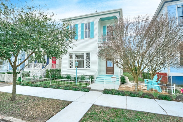 1323 Ball, Galveston, TX 77550 - view of front of house featuring a fenced front yard