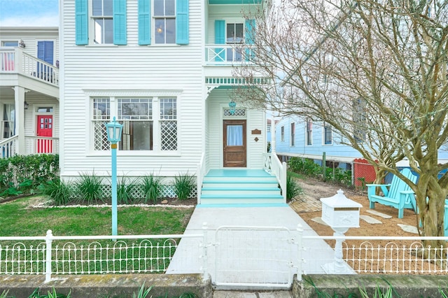 1323 Ball, Galveston, TX 77550 - view of front of house featuring a fenced front yard