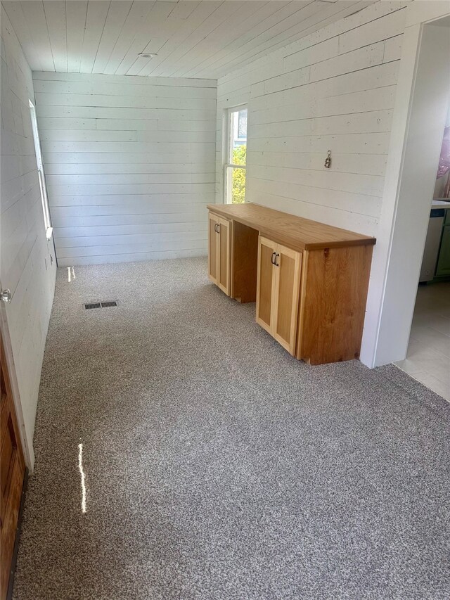 1323 Ball, Galveston, TX 77550 - bar with carpet flooring, wooden walls, and dishwasher