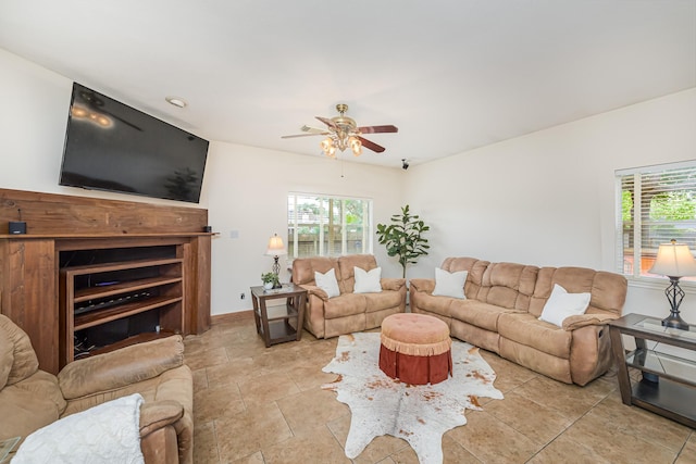 6249 Mallard Dr, Katy, TX 77493 - living area with ceiling fan, a wealth of natural light, and baseboards